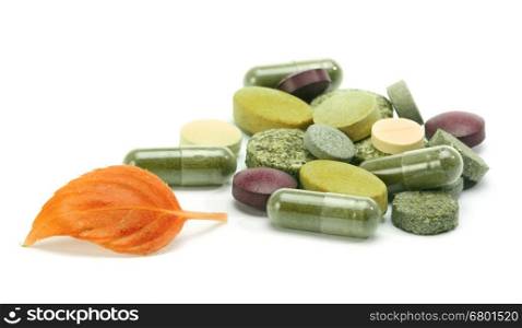 vitamins, pills, tablets and leaf