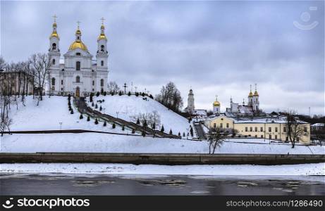 Vitebsk- the embankment of the Western Dvina River, the historical center of the city with cathedrals and town hall. Belarus