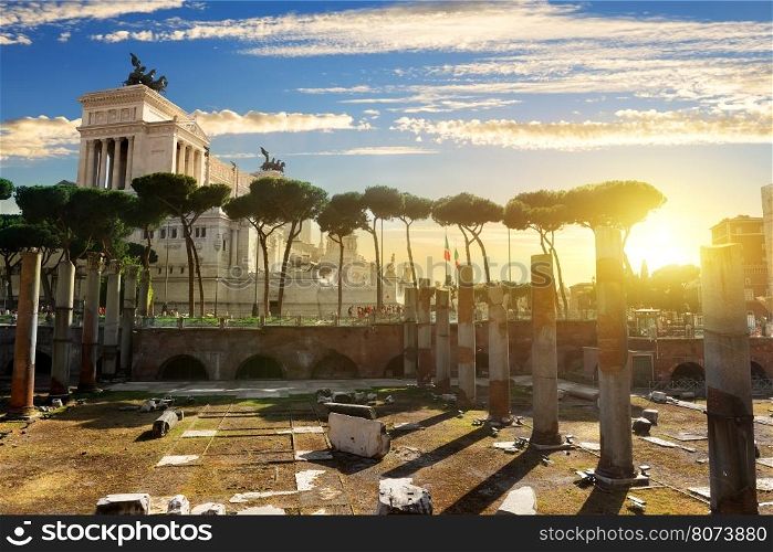Vittoriano and Forum Traiani in Rome at sunset, Italy