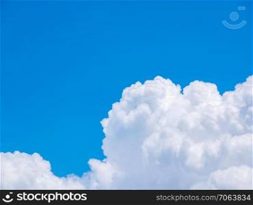 Vivid Blue sky with cloud.For use as background with empty space.