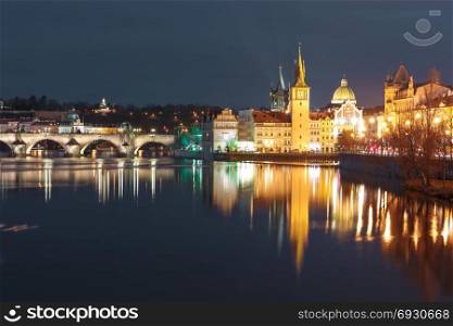Vltava River and Old Town at night in Prague. Picturesque night view of the Vltava River, Charles Bridge and Old Town in Prague, Czech Republic
