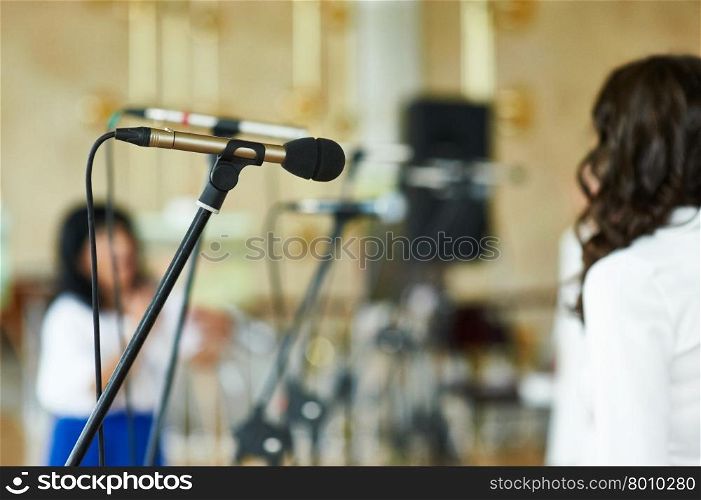 Vocal Dynamic Microphone on the stage at Conference