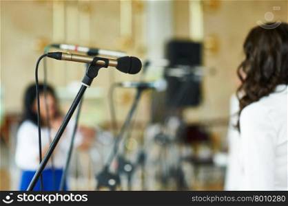 Vocal Dynamic Microphone on the stage at Conference