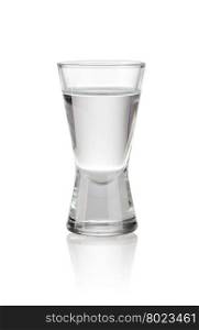 vodka. shot glass filled with vodka on a white background