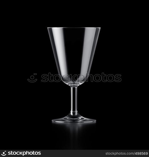 Vodka shot glass isolated on black background. Vodka shot glass