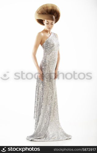 Vogue Style. Trendy Woman in Silver Silky Dress and Creative Hairstyle