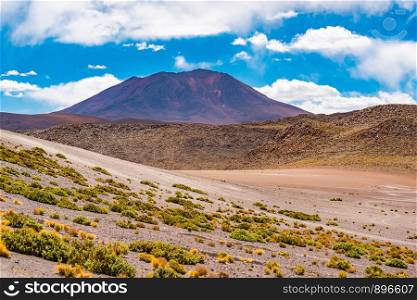Volcanic landscape in Uyuni National park, Bolivia with beautiful mountain in sunny day