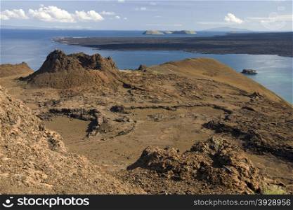 Volcanic landscape of cinder cones and lava field on the island of Bartolome in the Galapagos Islands - Ecuador