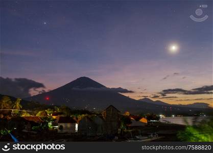 Volcano Agung and Amed beach, Bali, Indonesia at night