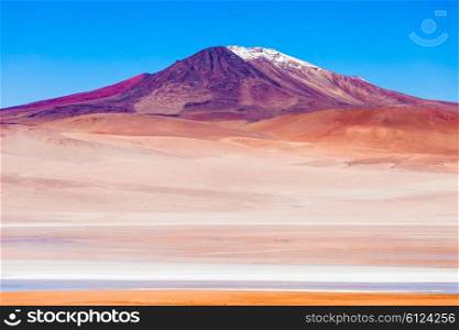 Volcano and lake on the bolivian Altiplano