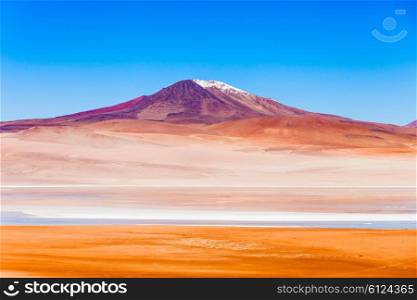 Volcano and lake on the bolivian Altiplano