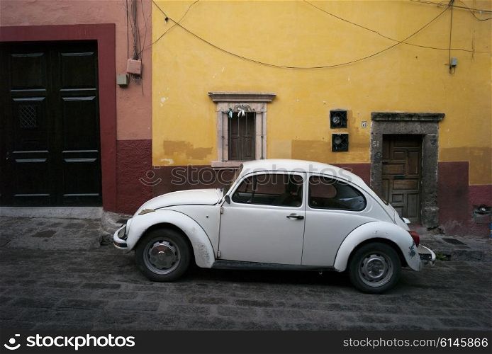 Volkswagon car on road, San Miguel de Allende, Guanajuato, Mexico