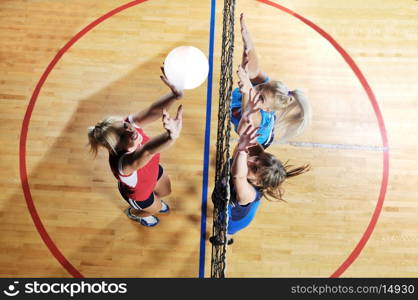 volleyball game sport with group of girls indoor in sport arena