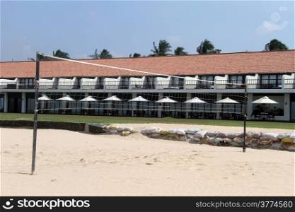 Volleyball net near hotel on the beach Bentota, Sri Lanka