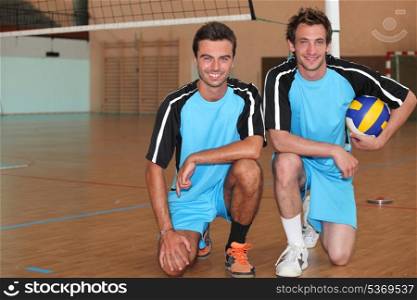 Volleyball players kneeling