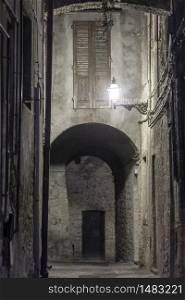 Volterra, Pisa, Tuscany, Italy: typical alley at evening