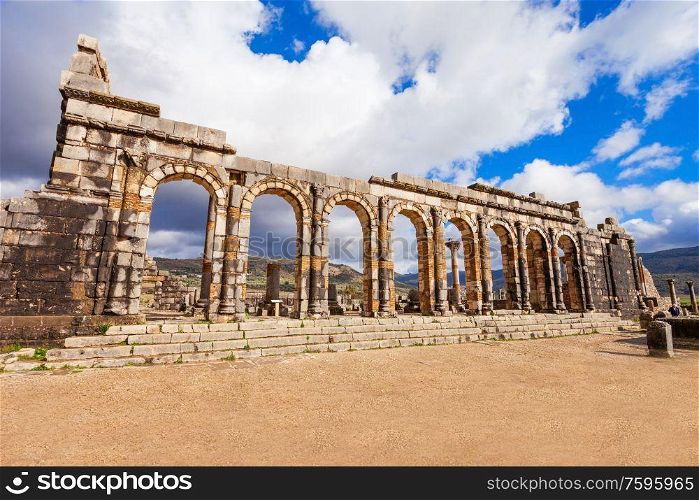 Volubilis near Meknes in Morocco. Volubilis is a partly excavated Amazigh, then Roman city in Morocco situated near Meknes, the ancient capital of the kingdom of Mauritania.