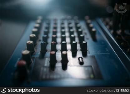 Volume control panel, sound board closeup. Professional audio engineering