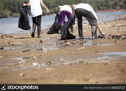 Volunteers cleaning environment