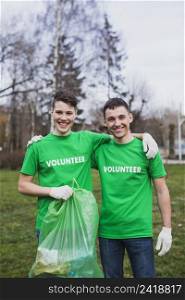 volunteers with trash