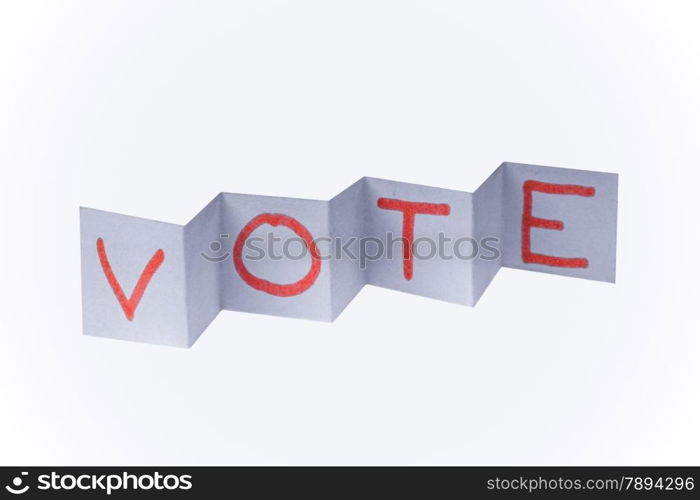VOTE word written on paper