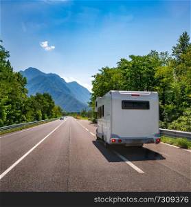 VR Caravan car travels on the highway. Tourism vacation and traveling.