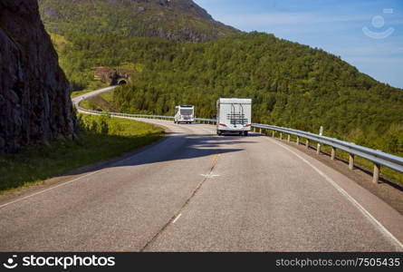 VR Caravan car travels on the highway. Tourism vacation and traveling. Beautiful Nature Norway natural landscape.