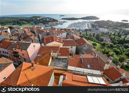 Vrsar, Croatia - May 22, 2018: View on old red roofs of small Croatian town Vrsar, Croatia. View on old red roofs of small Croatian town Vrsar, Croatia