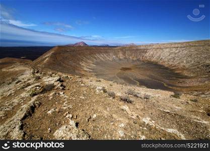 vulcanic timanfaya rock stone sky hill and summer in los volcanes lanzarote spain
