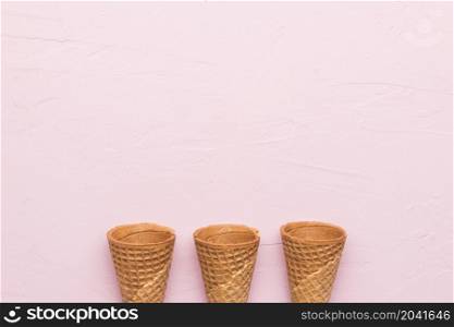 waffle cones pink background