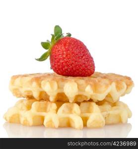Waffles and strawberry isolated on white background.