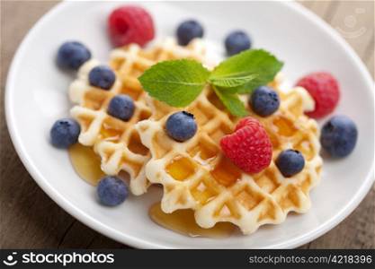 waffles with fresh berries and honey
