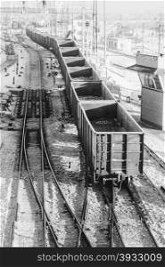 wagons loaded with coal riding the rails