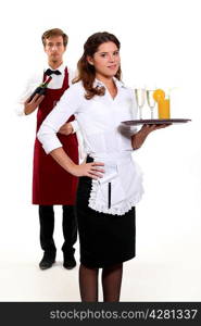 Waiter and waitress with a drinks tray