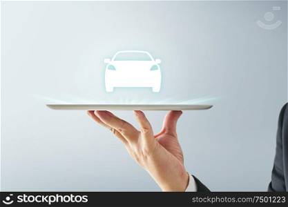 Waiter hand holding an empty digital tablet with virtual screen dispaly a car , Isolated on white background . concept of online car trade service .