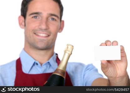 Waiter holding business card