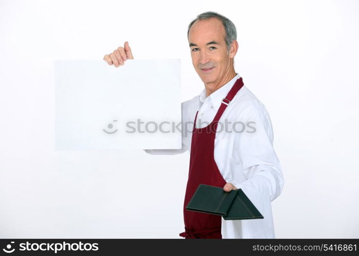 Waiter showing the menu