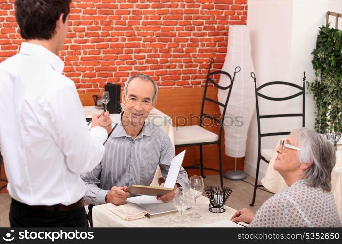 Waiter taking an order