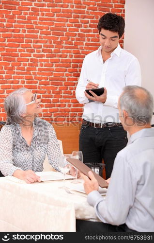 Waiter taking order in a restaurant