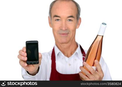 Waiter with bottle and phone