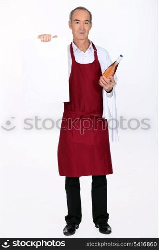 Waiter with bottle of wine