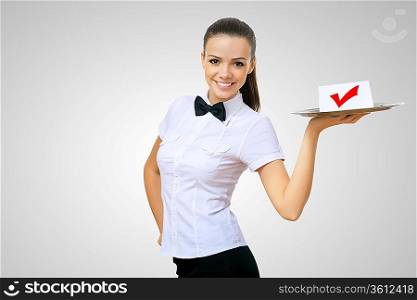 Waitress holding a tray with symbol of success on it