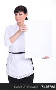 Waitress holding up a blank sign