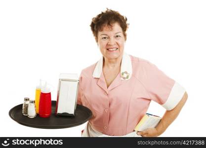Waitress puts away condiments at the end of the day. Isolated