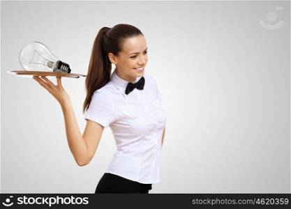 Waitress with a bulb on th etray as symbol of safe energy