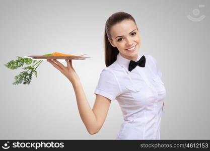 Waitress with a carrot on her tray