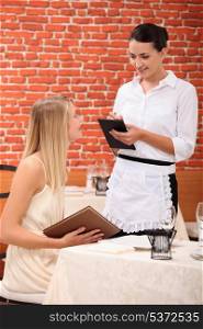 Waitress with customer