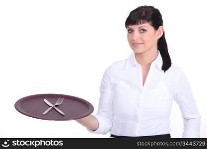 Waitress with tray and cutlery