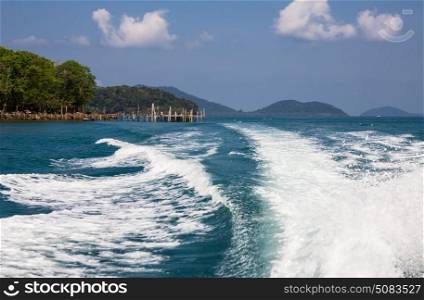 Wake of speed boat in the tropical sea