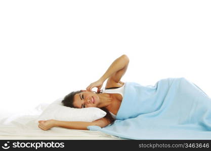 waking woman on the white pillow